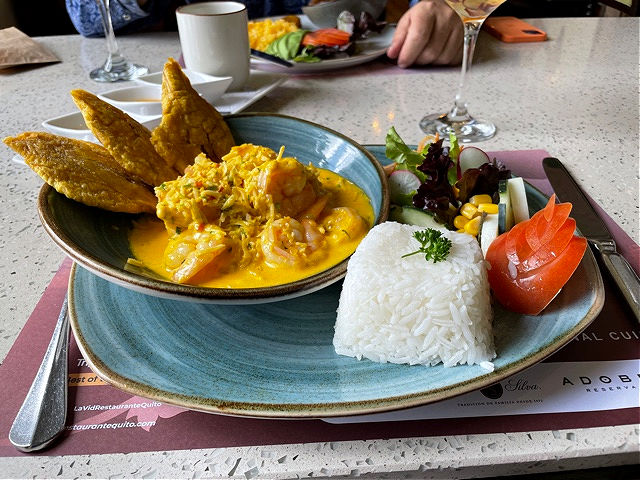 Quito cuisine - an Ecuadorian coastal dish called pescado encocado or coconut fish curry